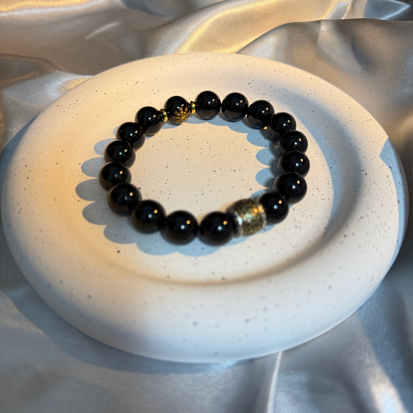 Obsidian Bracelet with Rotating Metal Fortune Bead – Protection & Energy