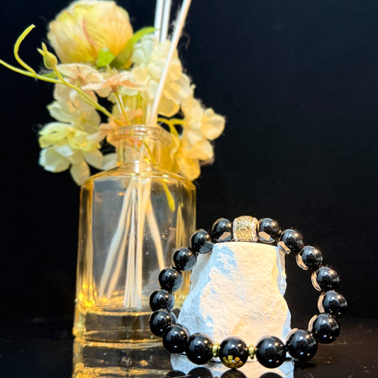 Obsidian Bracelet with Rotating Metal Fortune Bead – Protection & Energy